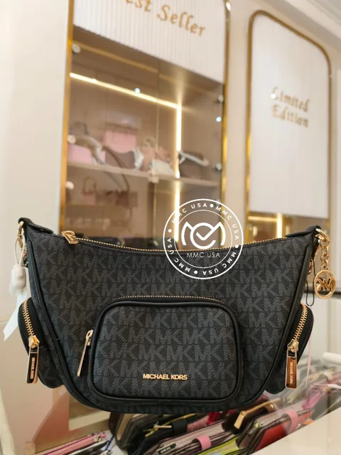 MK MERRIT SMALL CONV POCKET CROSSBODY SIGN