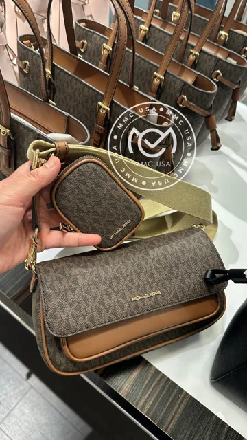 MK JET SET TECH CROSSBODY SIGN PVC